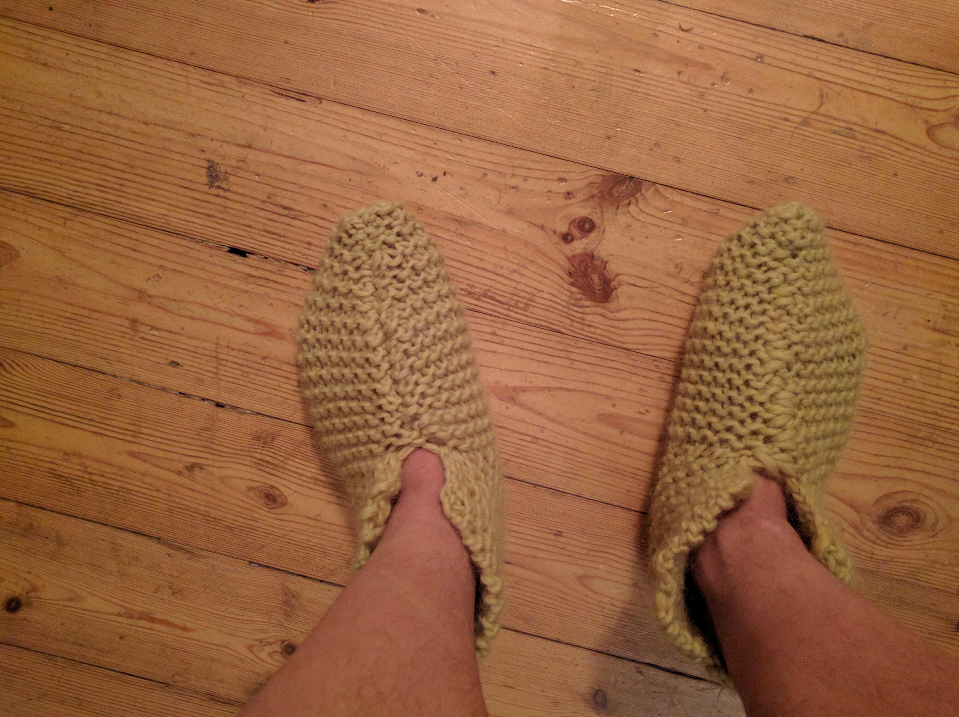 A pair of knitted slippers